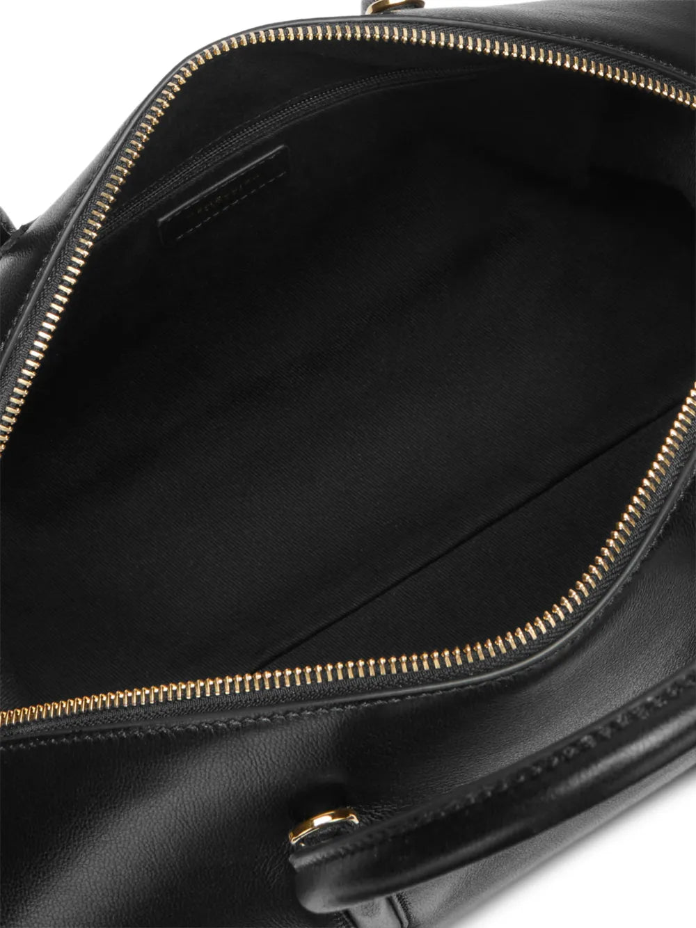Open interior of the DeMellier Midi Stockholm showing the zip and slip pockets