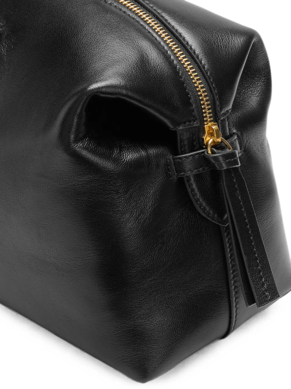 Side tab and leather zip pull detail on the DeMellier Midi Stockholm