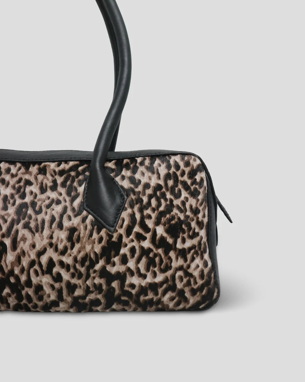 Close-up of the hair-on cowhide and a top handle