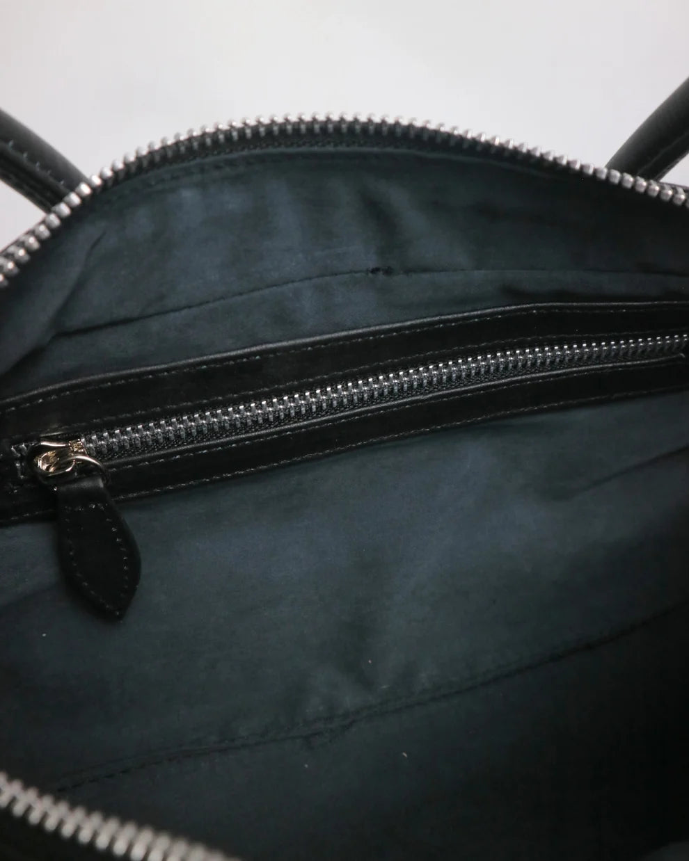 Interior of the Cila bag with the zip opened