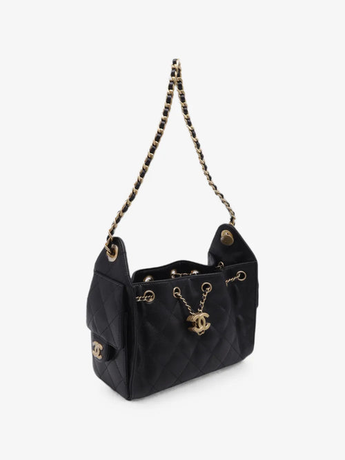 Chanel caviar shoulder bag, three-quarter view with side flap pockets